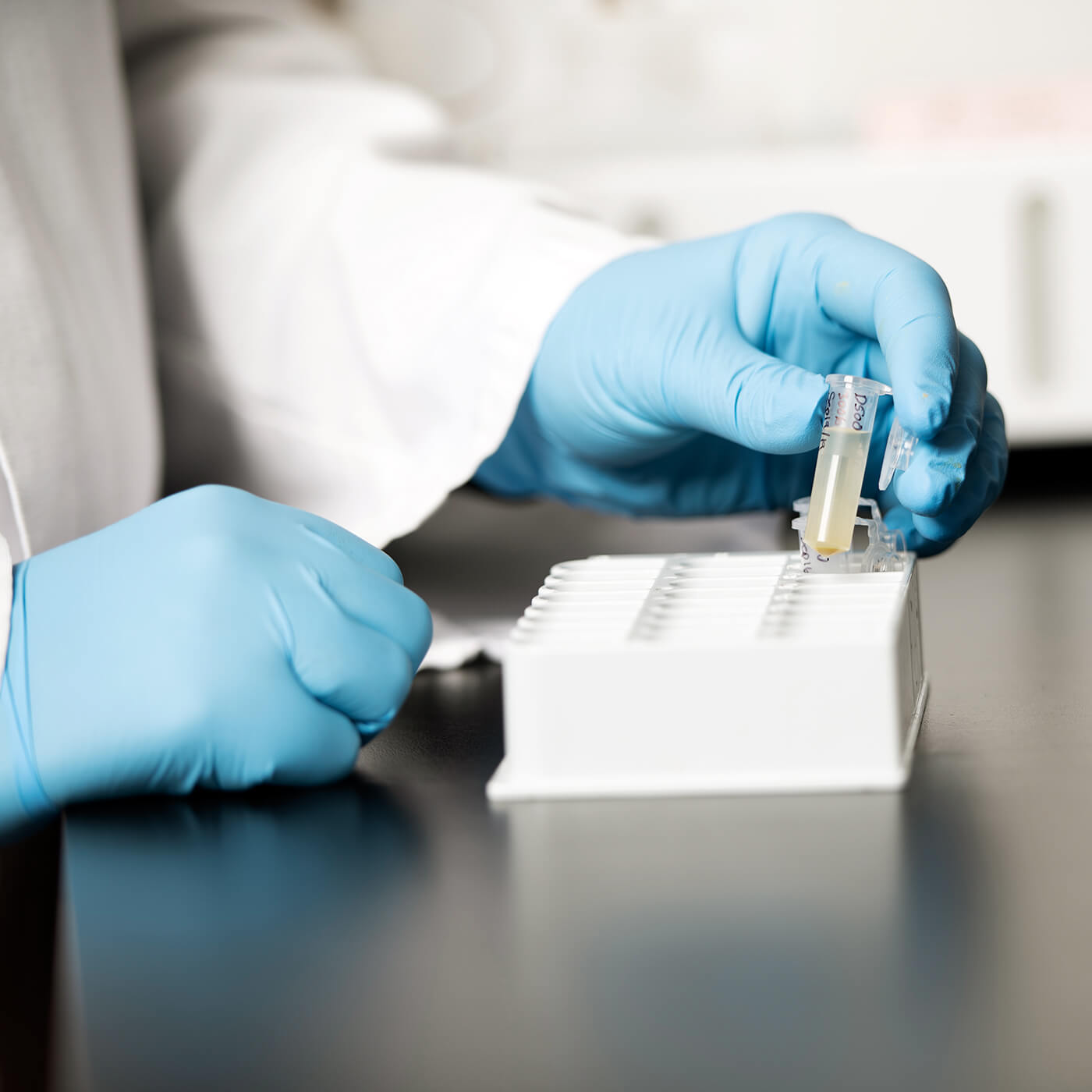 A Noblegen scientist using our biochemistry analyzer