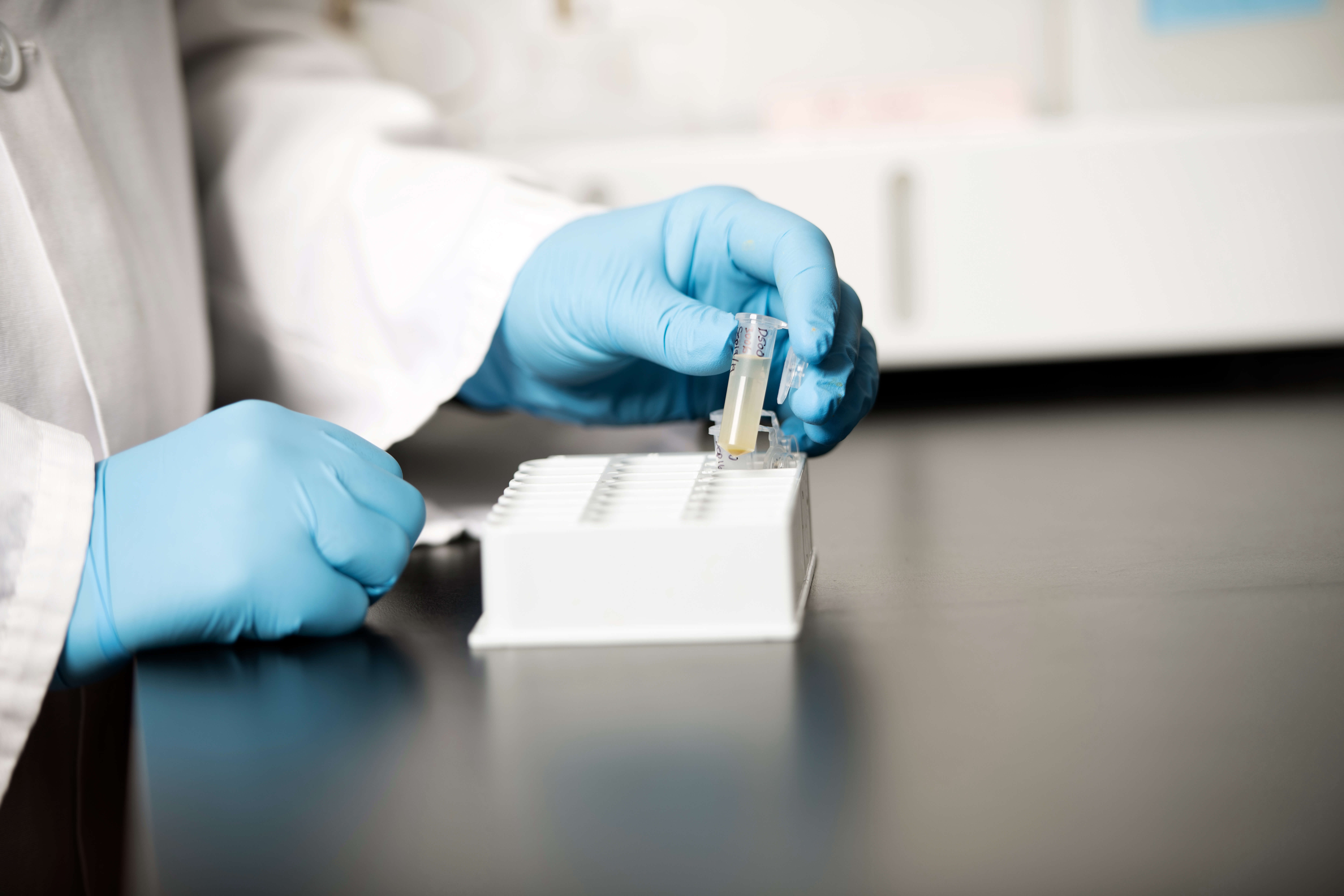 A Noblegen scientist using our biochemistry analyzer